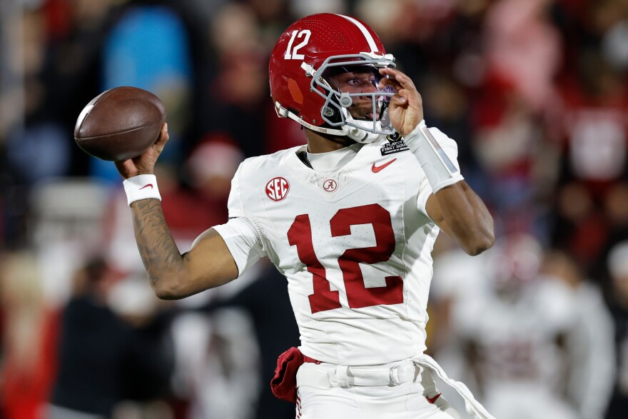 FILE - Alabama quarterback Keelon Russell (12) warms up before the first round of an NCAA College Football Playoff against Oklahoma on Dec. 19, 2025, in Norman, Okla. (AP Photo/Alonzo Adams, File)