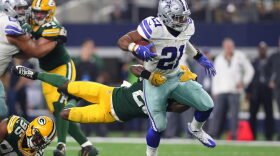 Ezekiel Elliott of the Dallas Cowboys carries the ball during the fourth quarter against the Green Bay Packers in the NFC Divisional Playoff game at AT&T Stadium on Jan. 15, 2017 in Arlington, Texas.  (Tom Pennington/Getty Images)