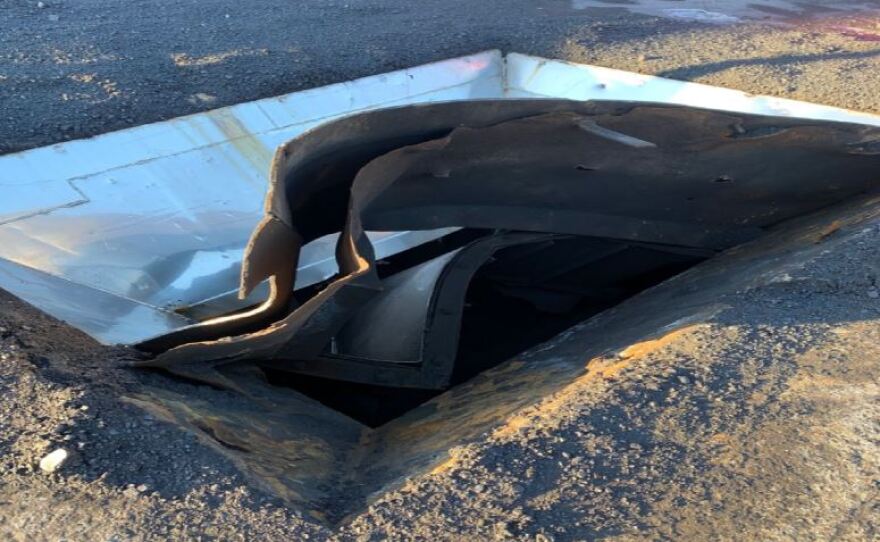 A photo that shows a coal feeder hole for VF-21 from the surface of the coal transfer yard. This is used in the CSX operations in Curtis Bay. The photo was included in an investigator's report.