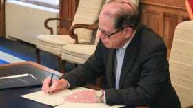Gov. Mike Braun signed a series of executive orders aiming to remake the administrative side of state government.
