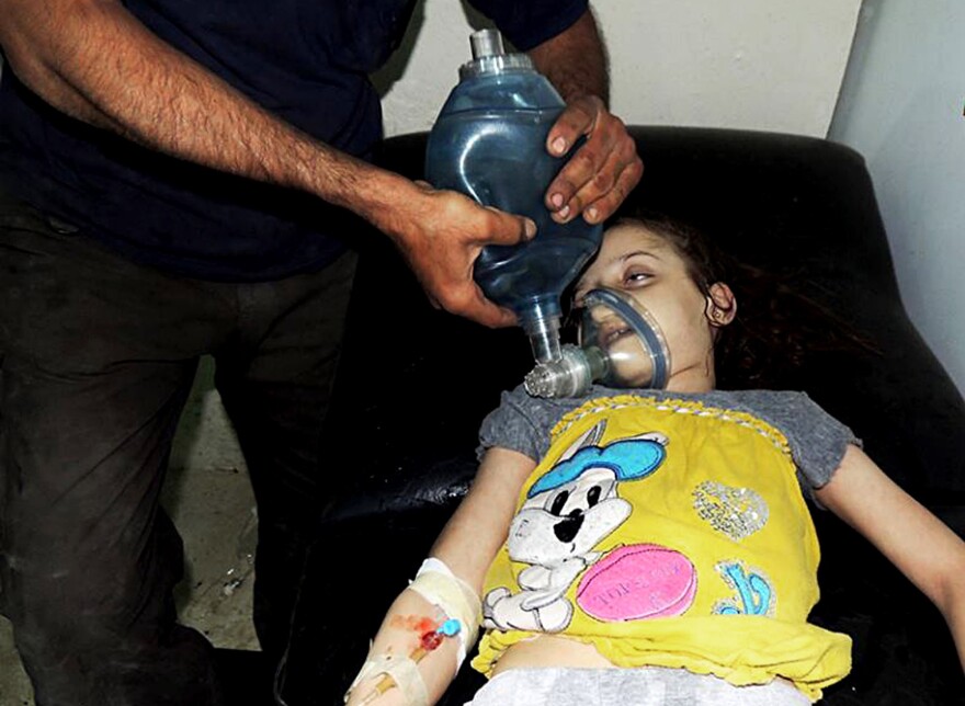 A young girl receives treatment at a makeshift hospital in Damascus, Syria, after a suspected chemical weapons attack by the military.
