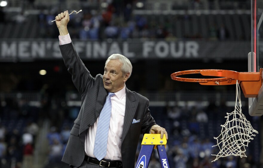 North Carolina head coach Roy Williams celebrates after his team's 89-72 victory over Michigan State in the championship game at the men's NCAA Final Four college basketball tournament in Detroit, in this Tuesday, April 7, 2009, file photo. North Carolina announced Thursday, April 1, 2021, that Hall of Fame basketball coach Roy Williams is retiring after a 33-year career that includes three national championships.