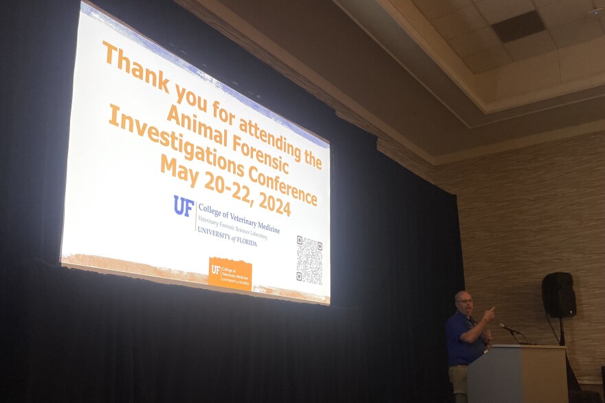 Dr. Adam Stern, an associate professor of forensic pathology at the UF College of Veterinary Medicine, gives opening remarks at the conference on Monday. (Bonny Matejowsky/WUFT News)