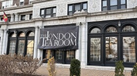 A London Tea Room banner hangs on a building off Union Boulevard in DeBaliviere Place.