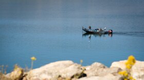 An angler fishing on Steinaker Reservoir, north of Vernal, Utah, Oct. 2, 2025