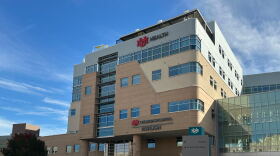 This photo taken with a smartphone shows the University of New Mexico Health System on Monday, Oct. 26, 2026, in Albuquerque, N.M. (AP Photo/Christopher Keller)
