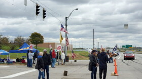 UAW members picket outside the GM Fort Wayne Assembly plant Thursday as they wait for word from the UAW National GM Council meeting in Detroit.