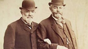 Two unidentified men pose in a photograph in this undated archival photograph. (Flickr/Varones)