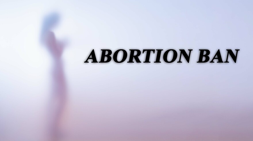 Blurred silhouette of a naked woman with text abortion ban