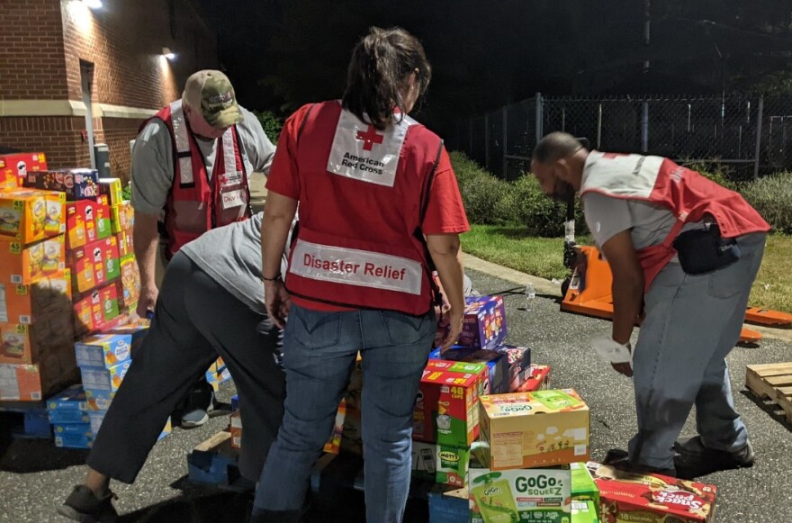 Red Cross Cascades Region has deployed emergency volunteers from across Oregon to provide disaster relief in Florida communities hit by Hurricane Ian. Here, volunteers work through the night to prepare food packages for shelters.