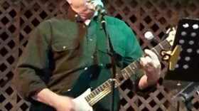 Gene Tipton on stage.
