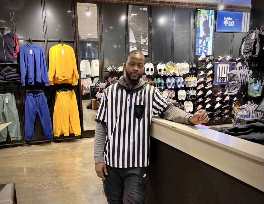 Laron Gilliam works two jobs to support his family. He says his part time job at Foot Locker pays minimum wage, and he wouldn't be able to survive on minimum wage alone.