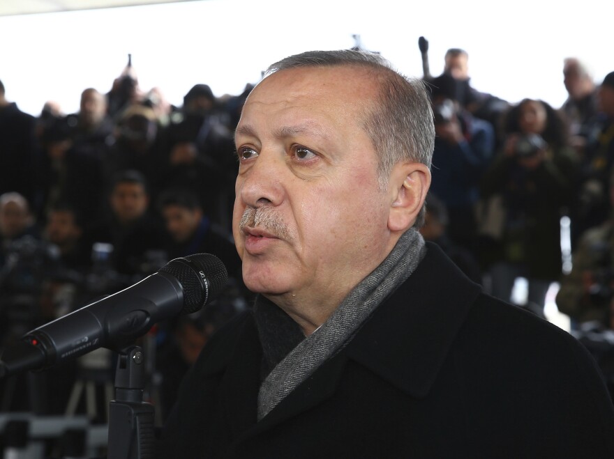Turkey's President Recep Tayyip Erdogan speaks in Ankara during the funeral prayers for Sgt. Musa Ozalkan, the first Turkish soldier to be killed in Turkey's cross-border "Operation Olive Branch" in northern Syria, on Tuesday.