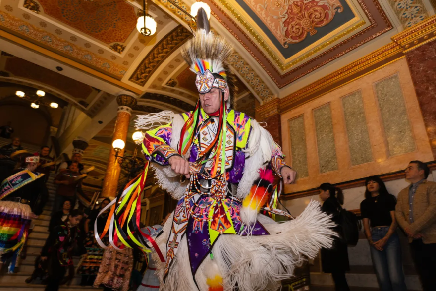 Native American man dances in Illinois Capitol