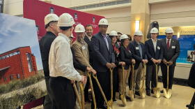 Thursday's groundbreaking ceremony had to be moved indoors due to the rain.