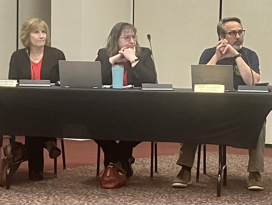 Washington Finance Director Joanie Baxter, left, Paulette Hurd and Police Chief Jeff Stevens watch a presentation Monday at a City Council meeting. Baxter is retiring soon after more than 30 years in her position and is being replaced by Hurd, who was hired last month.