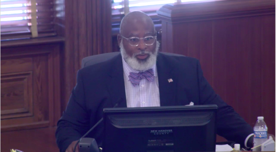 Commissioner Jonathan Barfield asking questions about whether other community partners were consulted about Novant Health's plans for the potential day homeless shelter.