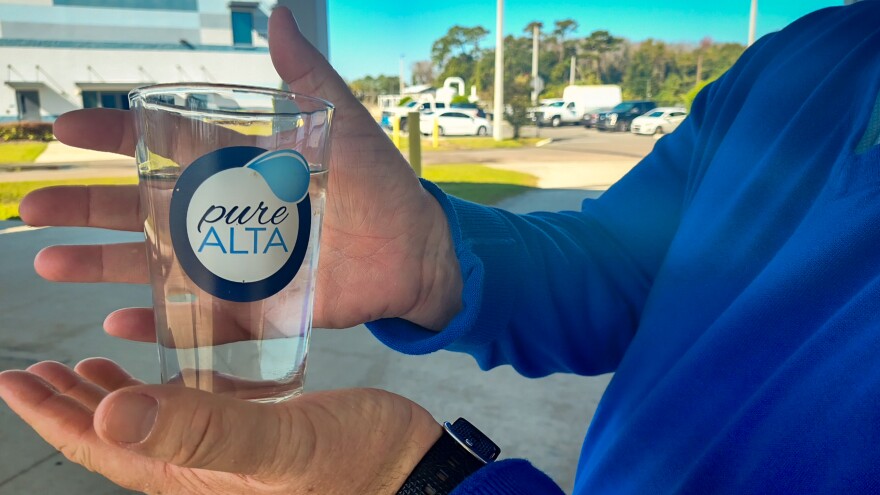 Altamonte Springs City Manager Frank Martz holds a glass of drinking water made at pureALTA from reclaimed water: recycled, treated wastewater. The finished water doesn’t smell or taste bad. “It is chemically clean. It is biologically clean,” Martz said.