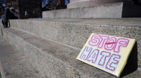 A sign seen in Chicago on March 20, 2021. A crowd gathered to demand justice for the victims of Atlanta, Georgia, spa shooting for an end to racism, xenophobia and misogyny. (Nam Y. Huh/AP)