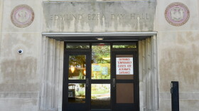A sign is displayed on a door at Day Hall after damage and graffiti overnight was cleaned up at Cornell University, Monday, Oct. 5, 2026, in Ithaca, N.Y. 