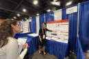 Lily Ma explaining her research to judges at this year's Regeneron International Science and Engineering Fair in Phoenix, Arizona.