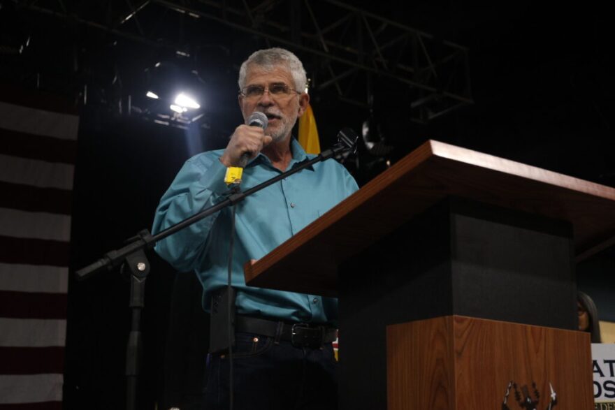 Matt Dodson, a Farmington-based democratic socialist, is seeking ballot placement as he runs against incumbent U.S. Sen. Ben Ray Lujàn (D-N.M.) in the Democratic primary. Above: Dodson speaks to delegates March 7, 2026 during the party’s pre-primary convention. (Patrick Lohmann/Source NM)