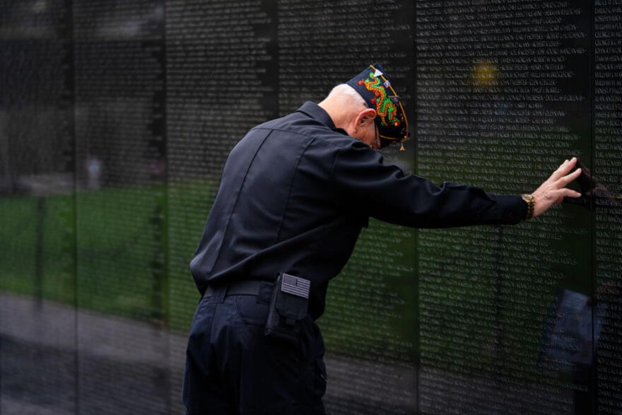 A veteran pays respects at the Vietnam Veterans Memorial, Monday, May 25, 2026, in Washington, D.C. (Allison Robbert/AP)