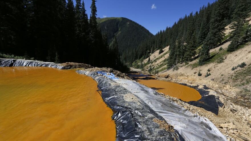 Water flows through a series of sediment retention ponds in August 2015 that were built to contain heavy metal and chemical contaminants from the Gold King Mine wastewater accident in Colorado. That site, and 47 others in southwest Colorado, were declared Superfund sites on Wednesday.