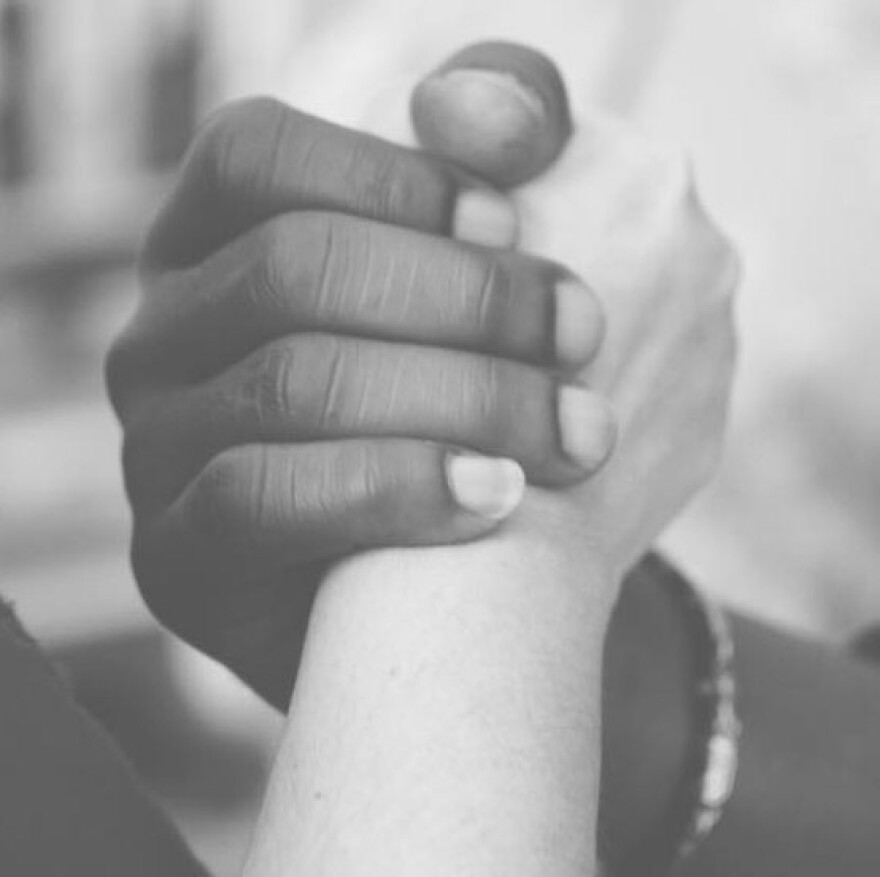 Clasped hands