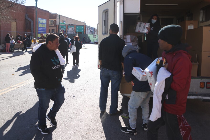 A food bank drops of food, blankets and supplies to asylum-seeking migrants living unsheltered after crossing the Rio Grande River into the United States in El Paso, Texas, U.S., December 22, 2022.