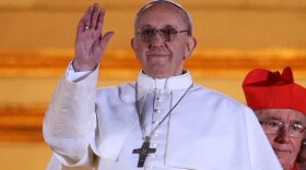 The newly elected Pope Francis (formerly known as opera lover and Argentine Cardinal Jorge Mario Bergoglio) appears on the balcony of St Peter's Basilica on March 13, 2013 in Vatican City.