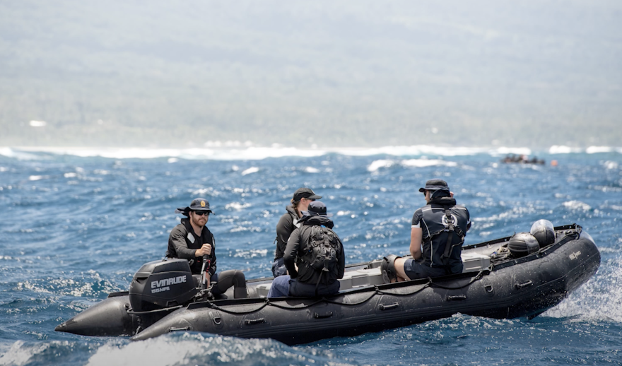 Navy divers surveyed the reef for damage as debris removal continues, shown in a video screenshot from Oct. 16, 2024.