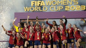 Team Spain celebrates after winning the Women's World Cup soccer final against England at Stadium Australia in Sydney, Australia, Sunday, Aug. 20, 2023. (AP Photo/Alessandra Tarantino)