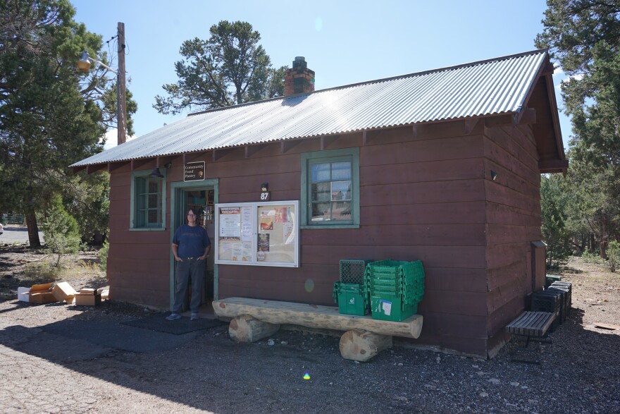 Flagstaff Family Food Center Operations Associate Heather Lapre stands in the door of the Grand Canyon Food Pantry on the first day of the government shutdown, Tuesday, Oct. 1, 2025.
