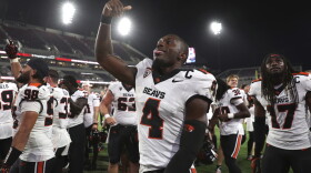 Oregon State quarterback Gevani McCoy reacts after winning against San Diego State at the end of an NCAA college football game Saturday, Sept. 7, 2024, in San Diego. (AP Photo/Raul Romero Jr.)