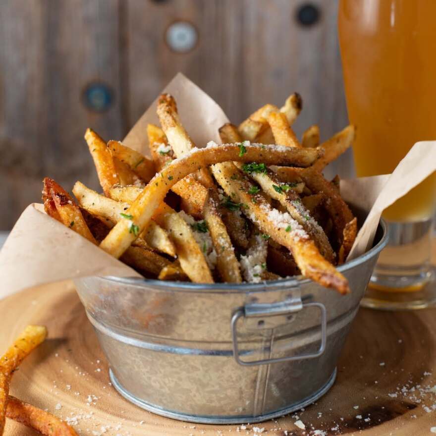 At Beer Kitchen in Westport, choose from regular or sweet potato fries, and eight different dipping sauces to go alongside.