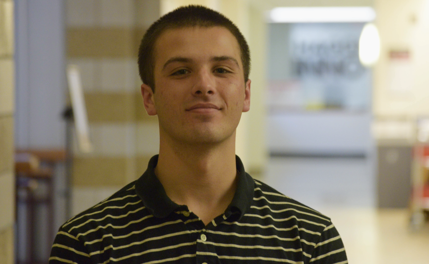 Man in striped shirt.