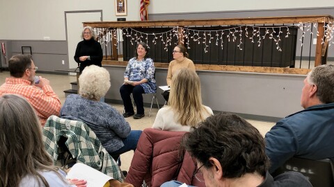 Town of Corning resident Joan Rosen introduces newly elected Democratic council members Linda Shock and Lauren Gaige during town hall meeting.