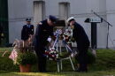 A wreath is placed in front of a steal beam from the World Trade Center, which was targeted in the attack, during Bloomington's Ivy Tech Community College's annual 9/11 ceremony on Sept. 11, 2025.