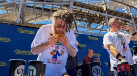 "Crazy Legs" Conti (left) competing at Lake Compounce during a Nathan’s Famous Hot Dog Eating Contest qualifier, where everyone is trying to prove they’re top dog June 13th 2026.