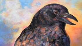 A painting of a crow set against a colorful sky.