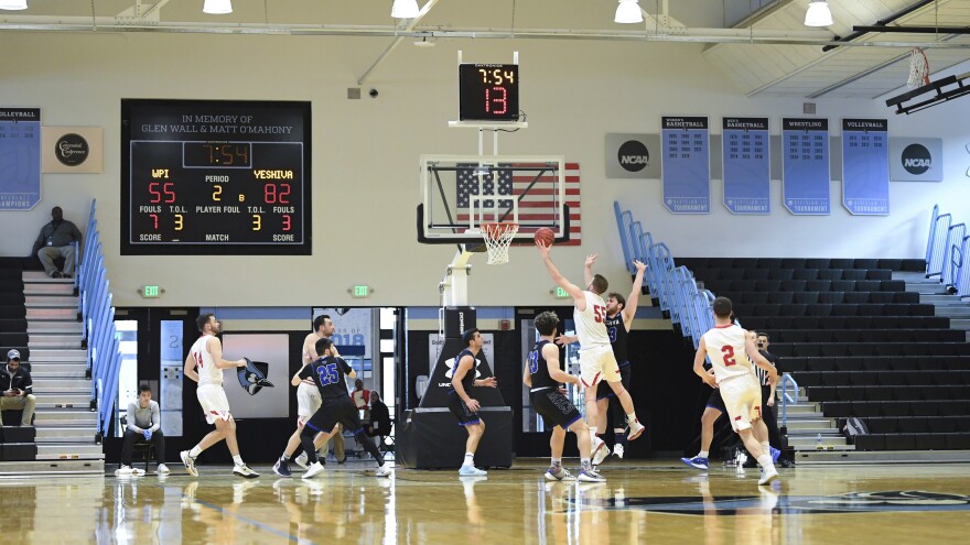 Two Division III programs, Worcester Polytechnic Institute and Yeshiva University, played in front of empty stands on Friday in Baltimore. Officials did not allow spectators because of coronavirus concerns in Maryland.