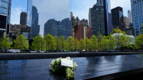 Flowers from Britain's King Charles III and Queen Camilla are seen at the 9/11 Memorial, Wednesday, April 29, 2026, in New York. (Yuki Iwamura/AP)
