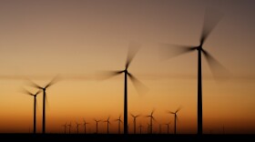 FILE - Wind turbines stretch across the horizon at dusk at the Spearville Wind Farm, Sept. 29, 2024, near Spearville, Kan. (AP Photo/Charlie Riedel, File)