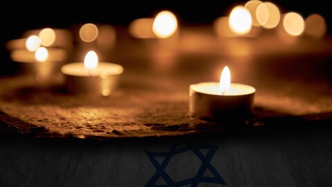 Candles burning over Star of David