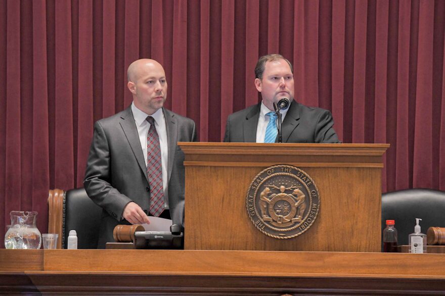  House Budget Committee Chairman Cody Smith, R-Carthage, left, watches floor debate on state spending with Speaker Rob Vescovo, R-Arnold.