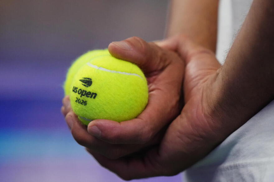 The logo for the U.S. Open tennis championships is visible on a ball during a practice session Thursday, Aug. 27, 2026, in New York. (Frank Franklin II/AP)