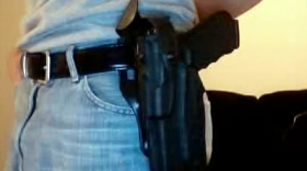 A gun in a holster example of open-carry