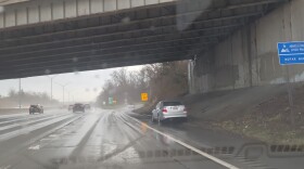 a car stranded on the side of a highway