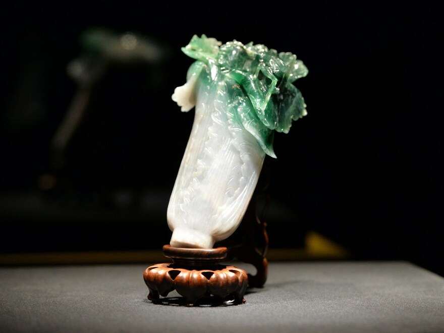 A jadeite cabbage is displayed at Japan's national museum during a preview of the "Treasured Masterpieces from the National Palace Museum, Taiwan" exhibition in Tokyo in 2014. The carving is one of the objects taken to safety from the Forbidden City. Chinese Nationalists brought it to Taiwan in 1949.